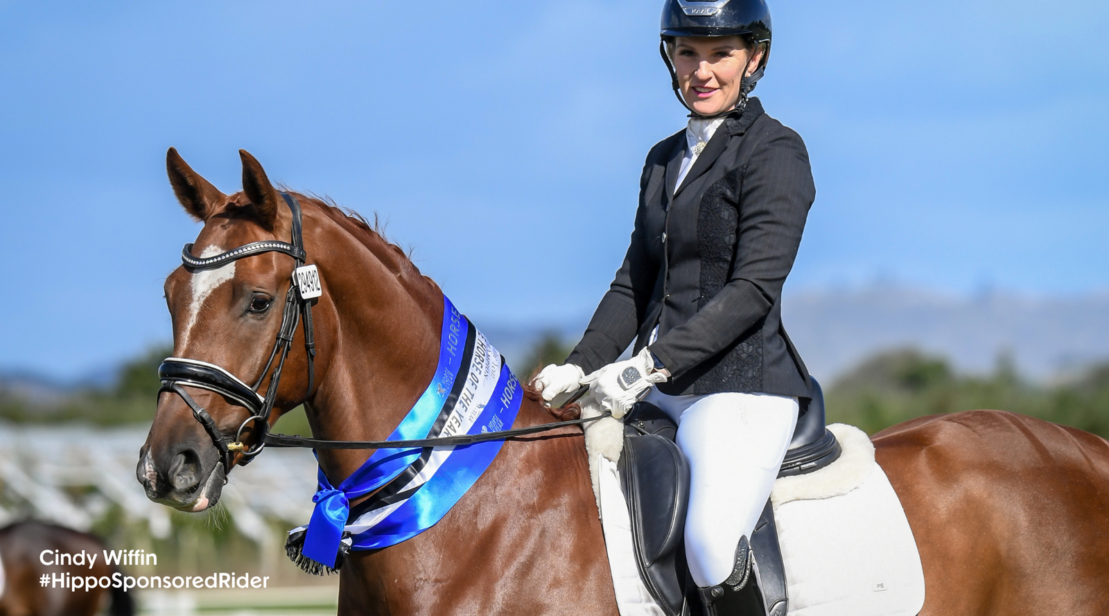 Hippo Health Sponsored Rider Cindy Wiffin competing at an equestrian event.